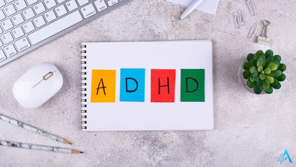 Organized workspace with ADHD planner and digital tools, illustrating support from AI tools for neurodivergent users